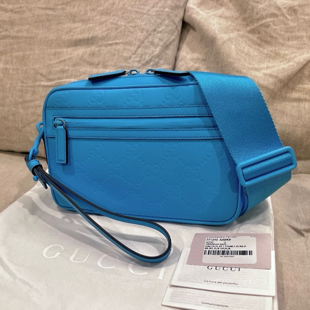 $2600 Gucci GG Logo Embossed Rubberized Leather Bag